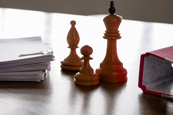 Hierarchy,And,Succession,Planning.,Chess,Pieces,On,The,Office,Table.